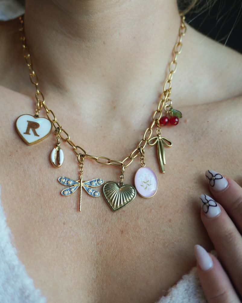 PEARL HEART INITIAL CHARM features a delicate pearl heart design with personalized initials, perfect for custom charm jewelry. | Lolo Jewelry