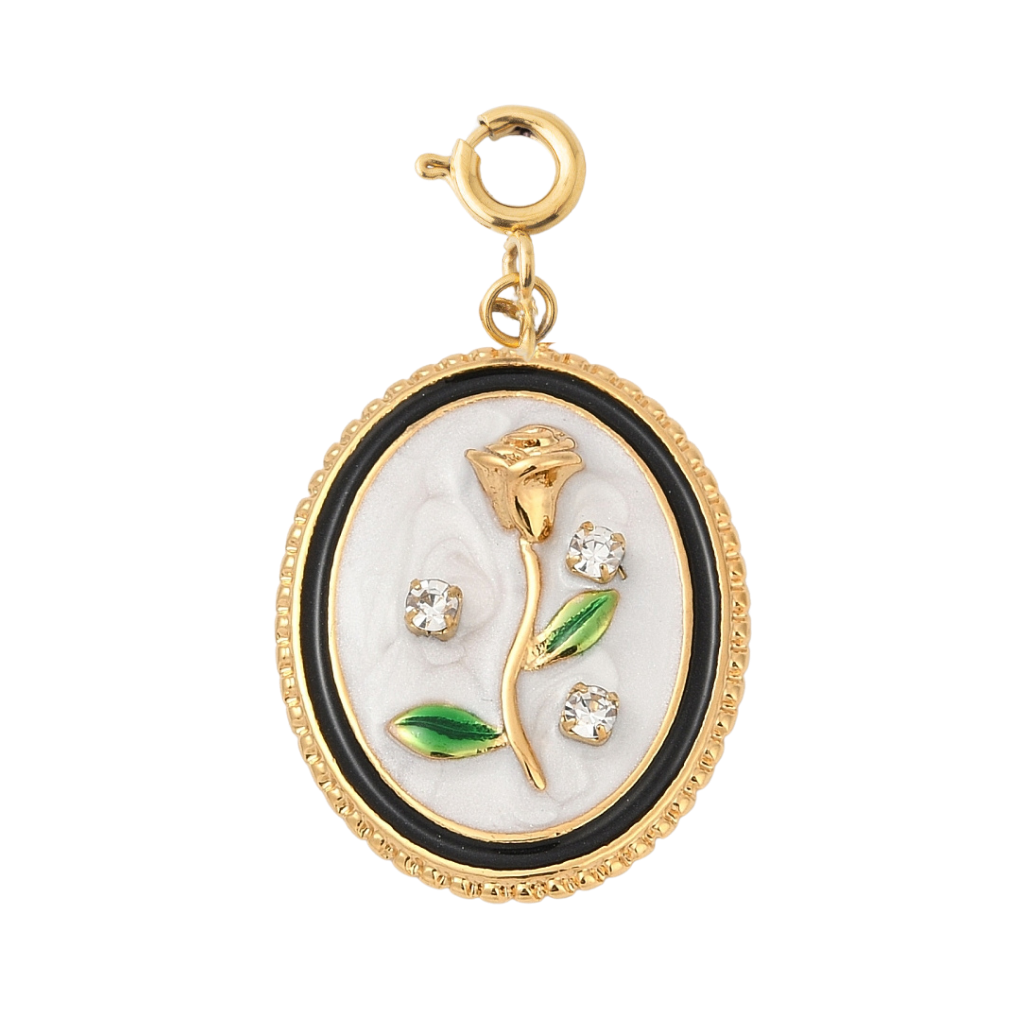The FLOWER PENDANT showcases a delicate floral design in gold, ideal for charm necklace styling | Lolo Jewelry.
